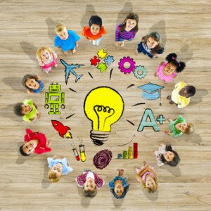 Group of Children in Circle with Light Bulb